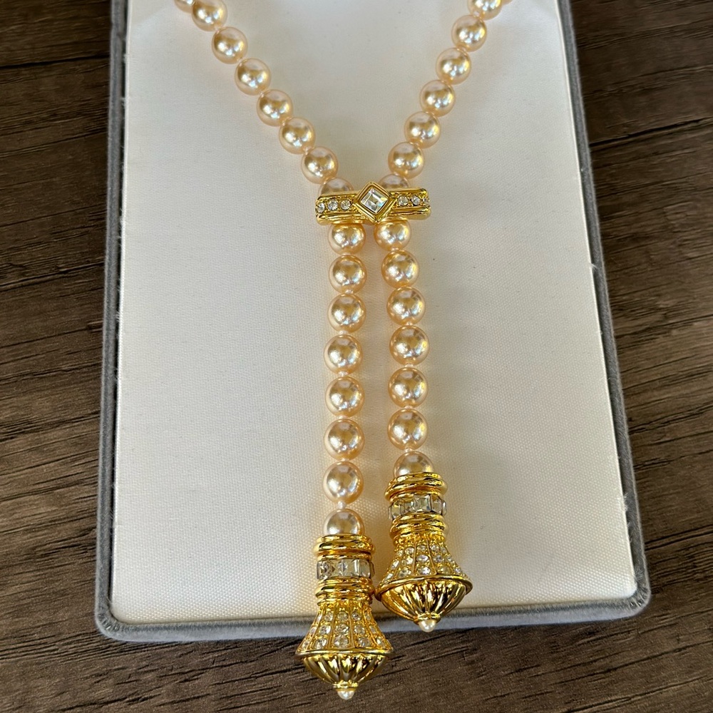 Nolan Miller elegant pearl, gold & crystal lariat necklace. Adjustable brooch.